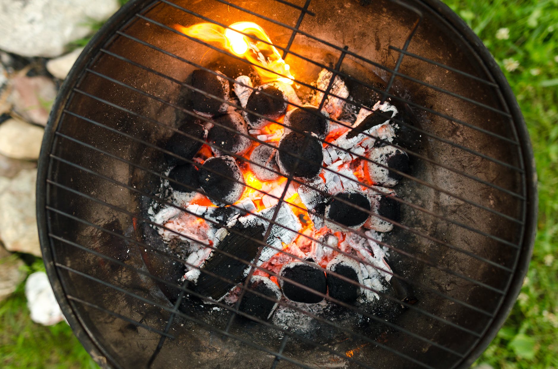 close up photo of black metal charcoal grill